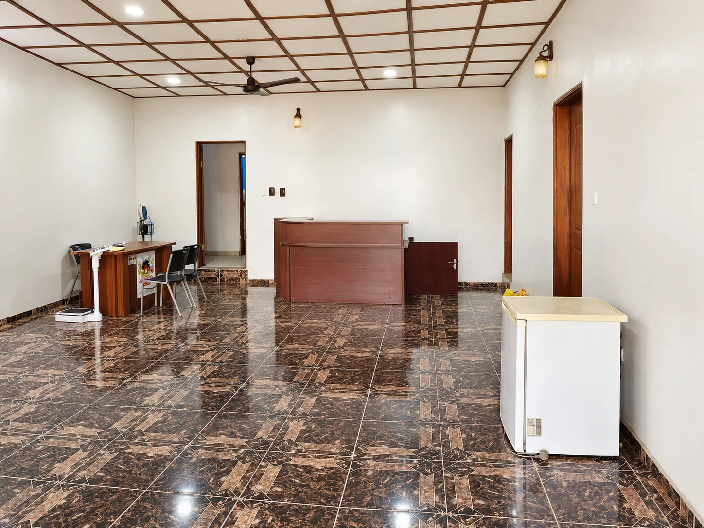 Reception desks and weighing scale at VAC Hospital